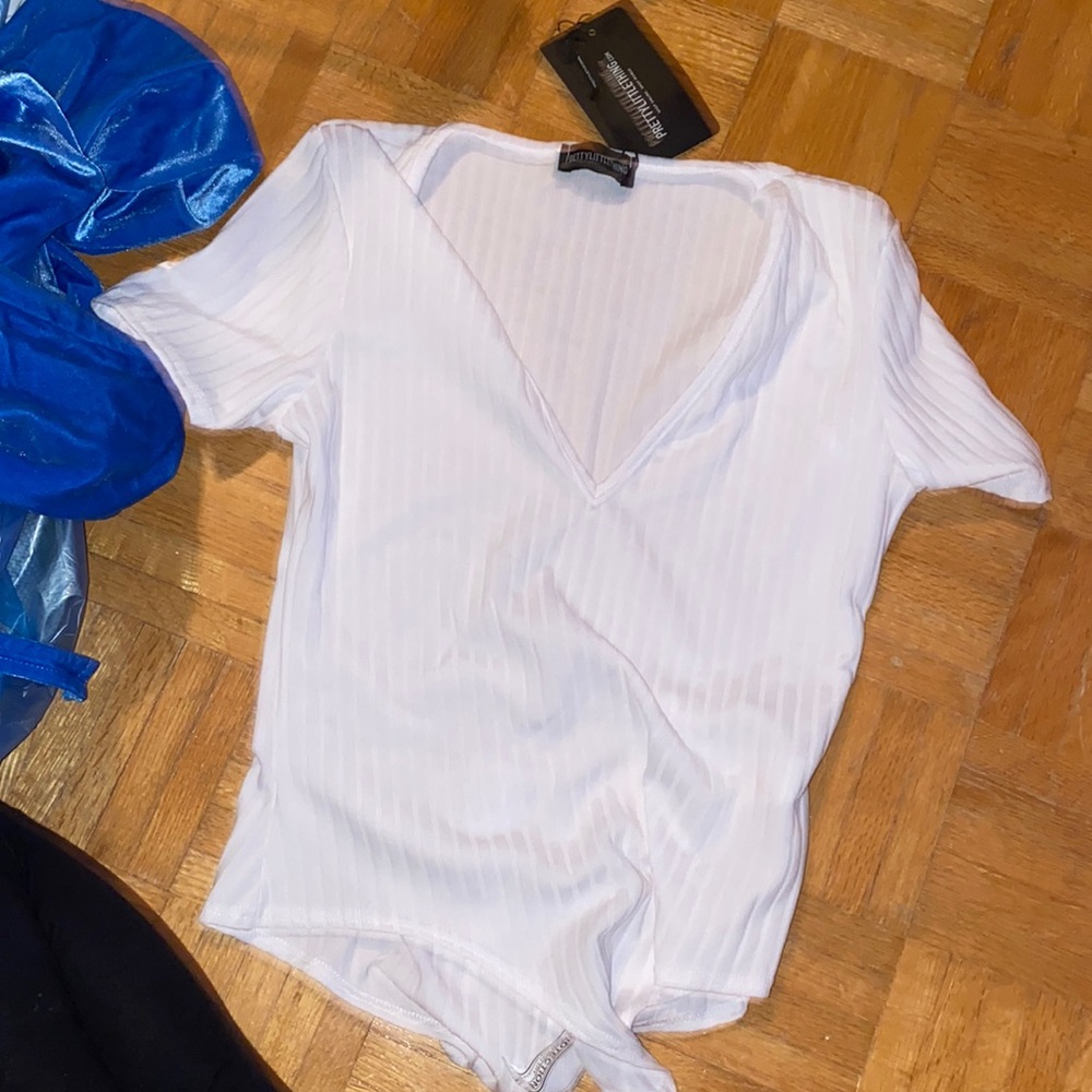 Beautiful brand new never worn pretty little thing bodysuit white